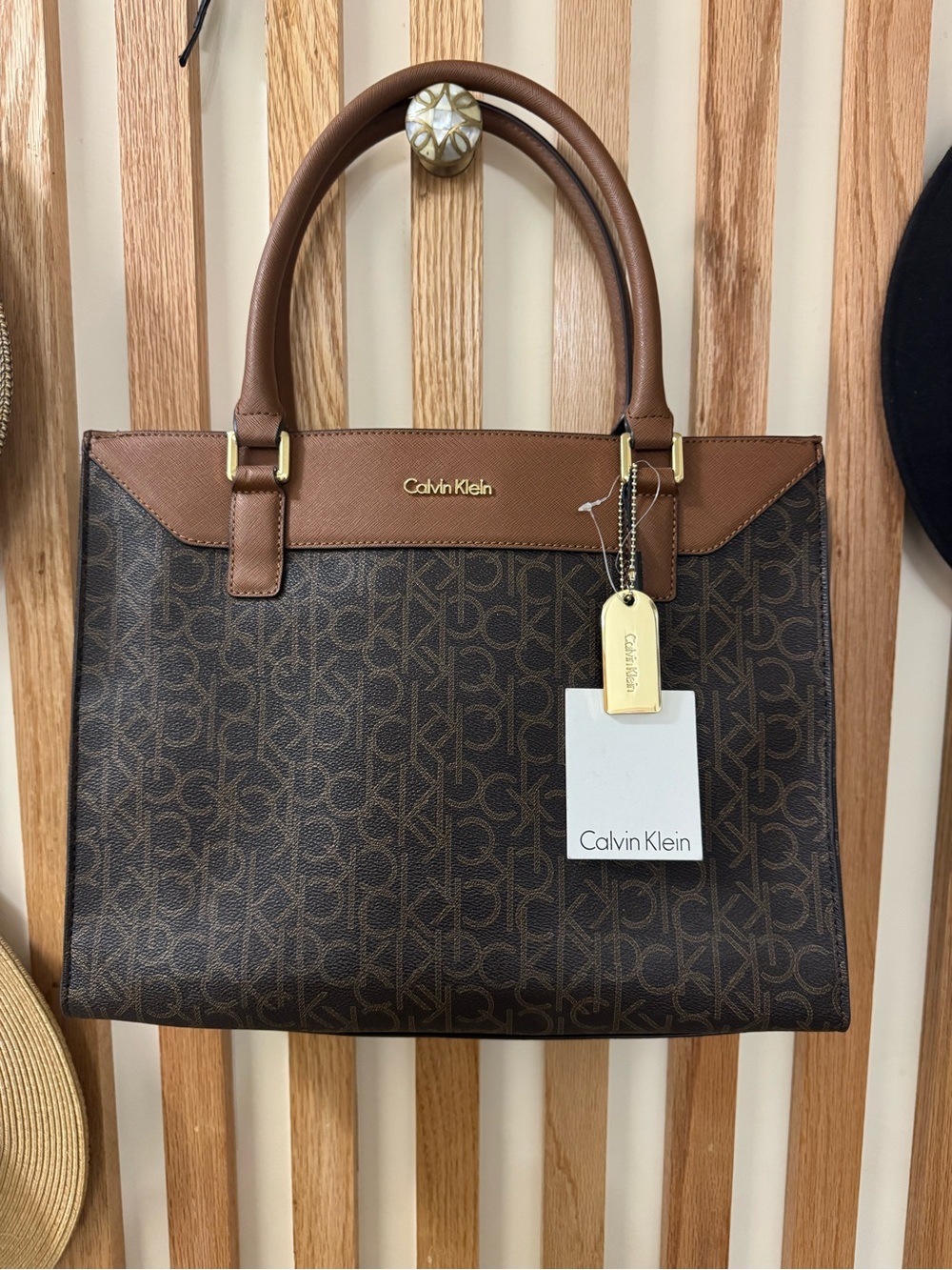 Travel tote you’ll love!
Calvin Klein Brown Monogram Tote Bag